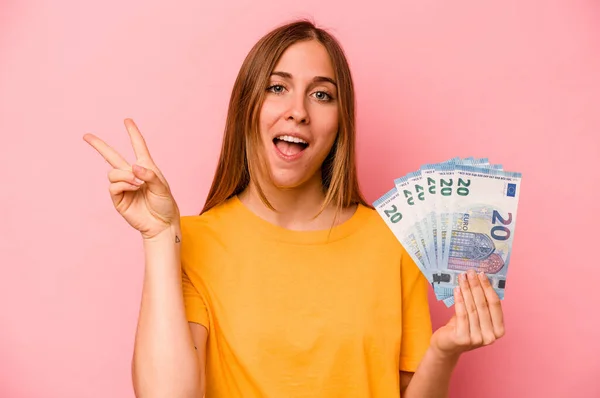 Young Caucasian Woman Holding Banknotes Isolated Pink Background Joyful Carefree — Stock Photo, Image