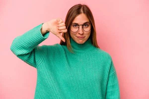 Young Caucasian Woman Isolated Pink Background Showing Dislike Gesture Thumbs — Stock Photo, Image