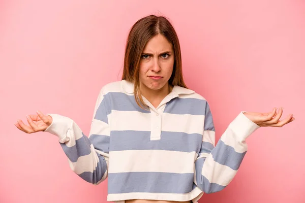 Jonge Blanke Vrouw Geïsoleerd Roze Achtergrond Twijfelen Schouders Ophalen Ondervraging — Stockfoto