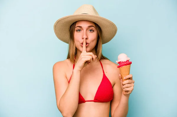 Young Caucasian Woman Wearing Bikini Holding Ice Cream Isolated Blue — Stock Photo, Image