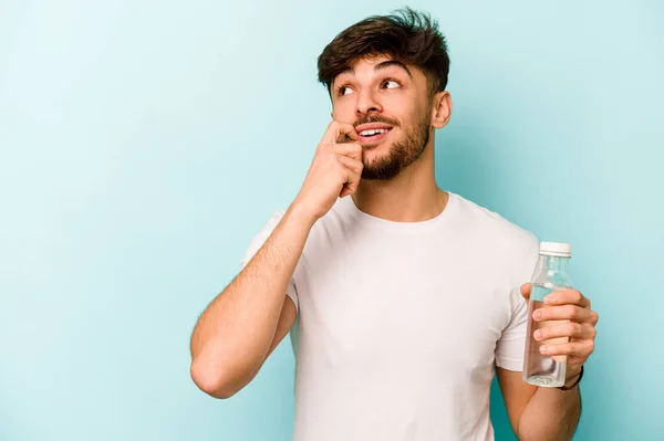 Young Hispanic Man Holding Bottle Water Isolated White Background Relaxed — Stockfoto