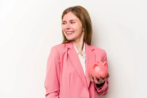 Young Business English Woman Holding Piggybank Isolated White Background Looks — Stock Photo, Image