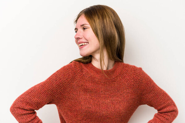 Young russian woman isolated on white background confident keeping hands on hips.