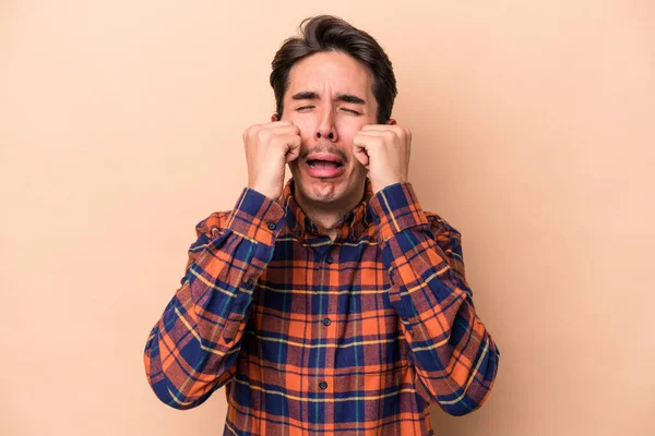 Young Caucasian Man Isolated Beige Background Whining Crying Disconsolately — Stock Photo, Image