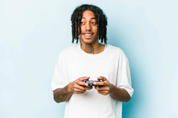 Young African American Man Playing Video Game Controller Isolated Blue — Stock Photo, Image