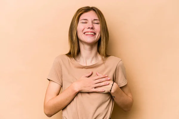 Young English Woman Isolated Beige Background Laughing Keeping Hands Heart — Stock Photo, Image