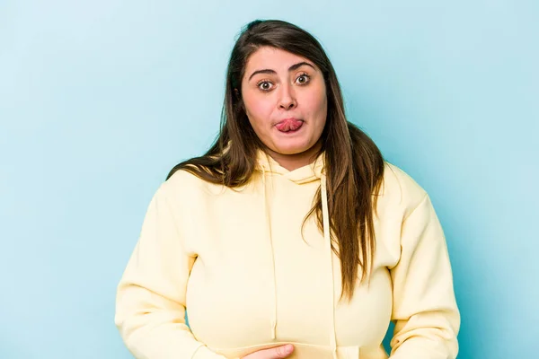 Young Caucasian Overweight Woman Isolated Blue Background Touches Tummy Smiles — Stockfoto