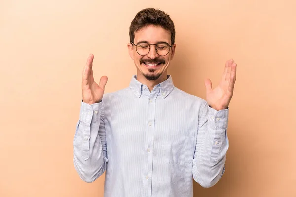 Young Caucasian Man Isolated Beige Background Joyful Laughing Lot Happiness — Stock Photo, Image