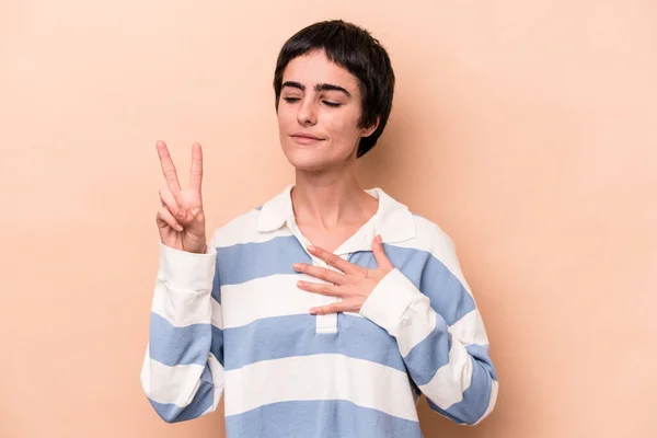 Young Caucasian Woman Isolated Beige Background Taking Oath Putting Hand — Stock Photo, Image