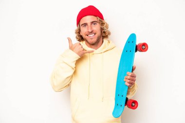 Young skater caucasian man isolated on white background showing a mobile phone call gesture with fingers.