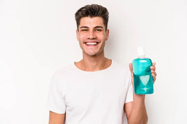 Young Caucasian Man Holding Mouthwash Isolated White Background Happy Smiling — Stockfoto