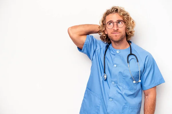 Young Nurse Caucasian Man Isolated White Background Touching Back Head — Stok fotoğraf