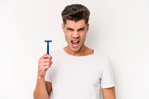 Young Caucasian Man Shaving His Beard Isolated White Background Screaming — Foto de Stock