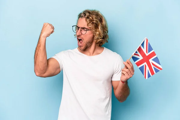 Young Student Caucasian Man Holding United Kingdom Flag Isolated Blue — Stock fotografie