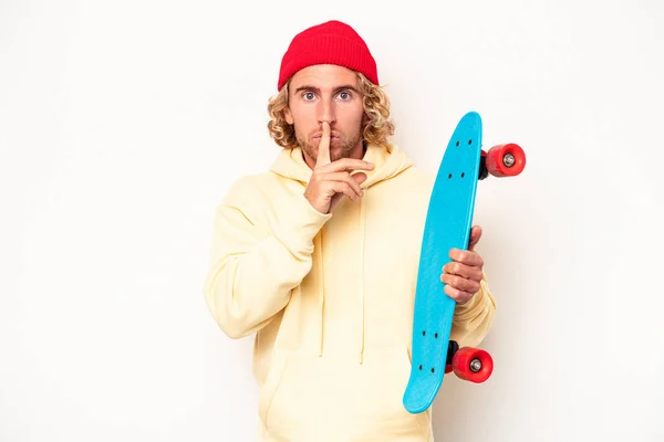 Young Skater Caucasian Man Isolated White Background Keeping Secret Asking — Stok fotoğraf