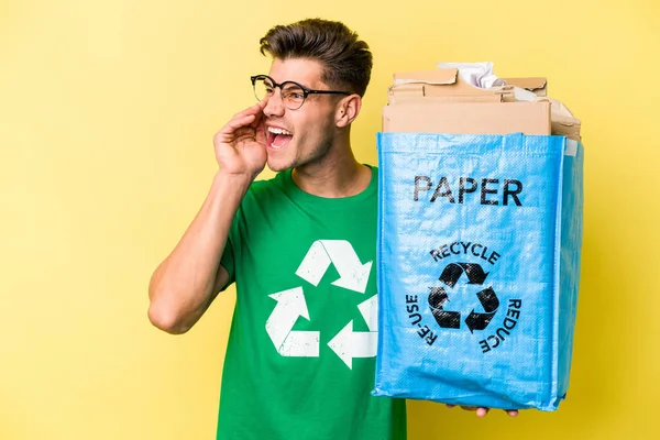Young Caucasian Man Holding Recycling Bag Full Paper Recycle Isolated — Stock fotografie