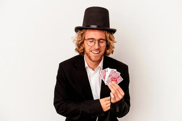 Young Magician Caucasian Man Holding Magic Cards Isolated White Background — Stockfoto