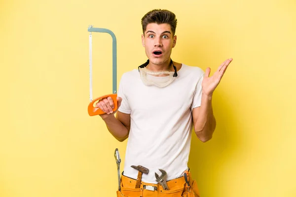 Young Electrician Caucasian Man Isolated Yellow Backgroun — Stock Fotó