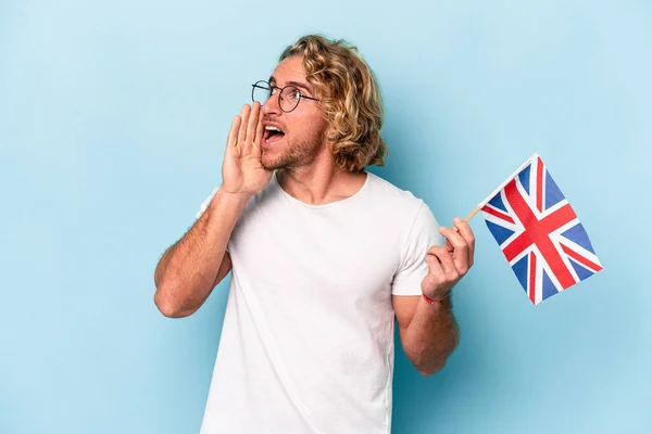Young Student Caucasian Man Holding United Kingdom Flag Isolated Blue — Stock fotografie