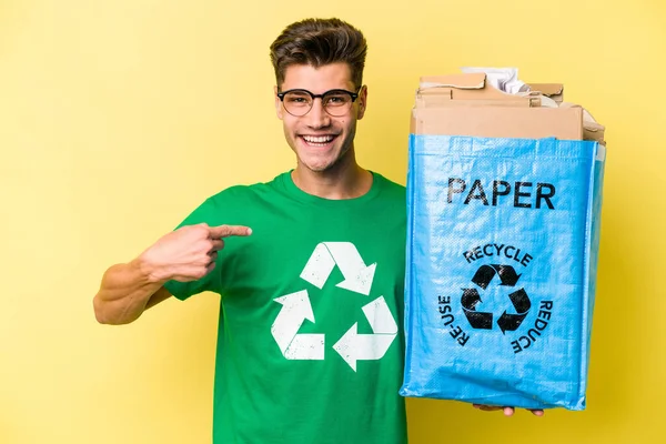 Young Caucasian Man Holding Recycling Bag Full Paper Recycle Isolated — Stockfoto