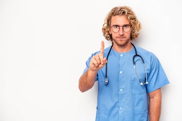 Young Nurse Caucasian Man Isolated White Background Showing Number One — Stock Photo, Image