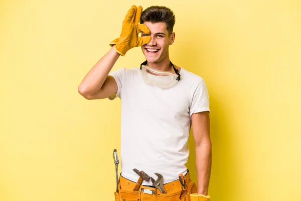 Young Electrician Caucasian Man Isolated Yellow Background Excited Keeping Gesture — Fotografia de Stock