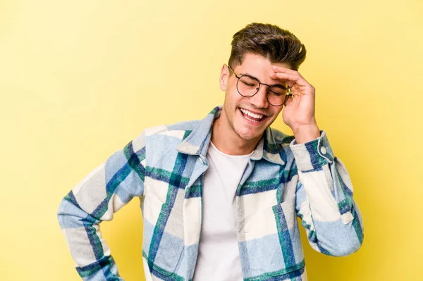 Young Caucasian Man Isolated Yellow Background Joyful Laughing Lot Happiness — Stock Photo, Image
