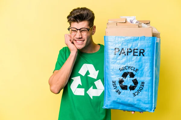 Young Caucasian Man Holding Recycling Bag Full Paper Recycle Isolated — Stock fotografie