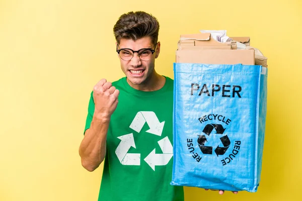 Young Caucasian Man Holding Recycling Bag Full Paper Recycle Isolated — Stock fotografie