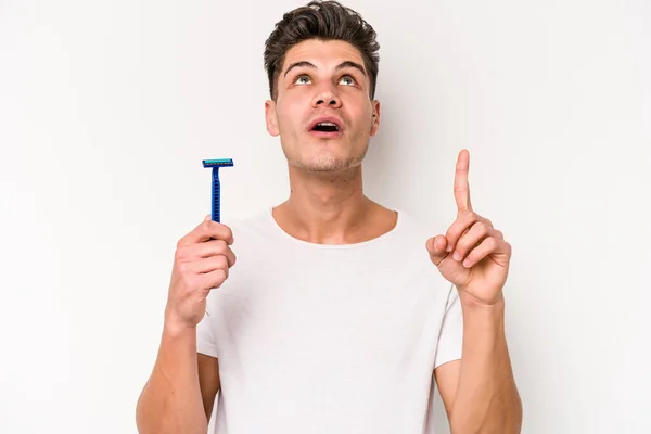 Young Caucasian Man Shaving His Beard Isolated White Background Pointing — Fotografia de Stock