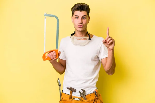 Young Electrician Caucasian Man Isolated Yellow Backgroun — Zdjęcie stockowe