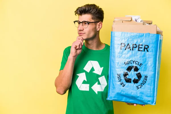 Young Caucasian Man Holding Recycling Bag Full Paper Recycle Isolated — Stockfoto