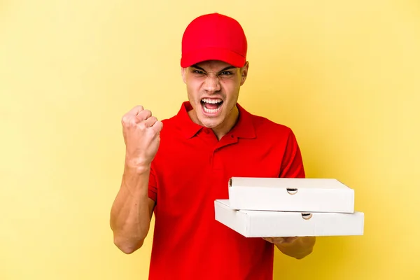 Young Delivery Caucasian Man Holding Pizzas Isolated Yellow Background Showing — ストック写真