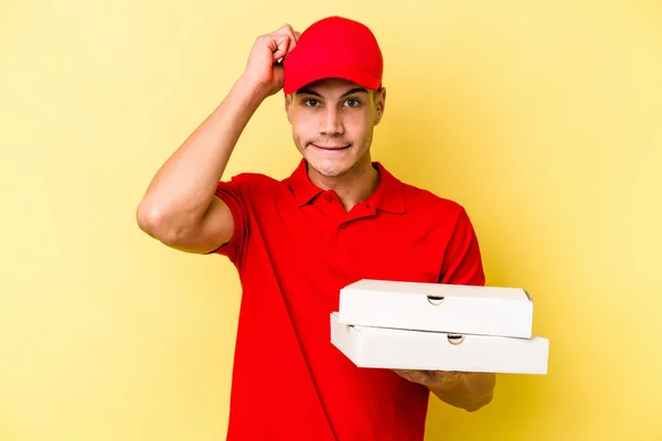 Young Delivery Caucasian Man Holding Pizzas Isolated Yellow Background Being — ストック写真