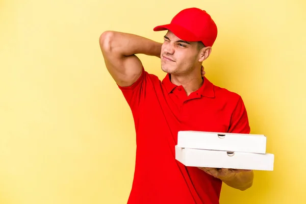 Young Delivery Caucasian Man Holding Pizzas Isolated Yellow Background Touching — Stockfoto