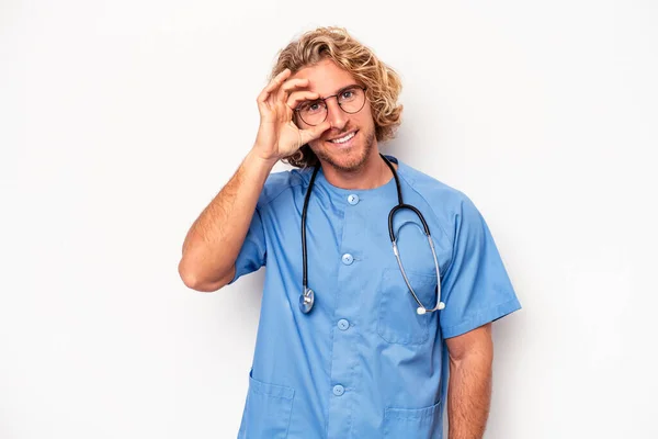 Young Nurse Caucasian Man Isolated White Background Excited Keeping Gesture — Stockfoto