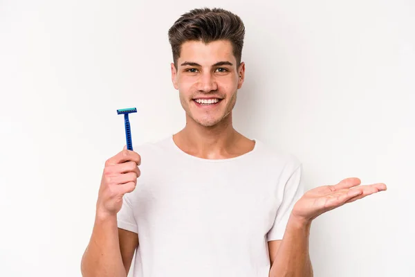 Young Caucasian Man Shaving His Beard Isolated White Background Showing — 图库照片