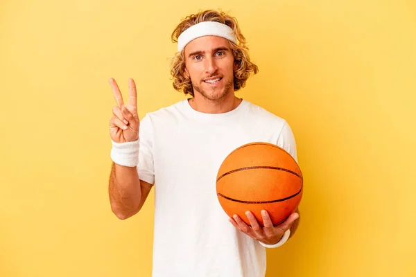 Young Basketball Player Caucasian Man Isolated Yellow Background Joyful Carefree — Zdjęcie stockowe