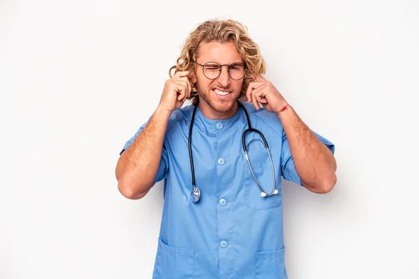 Young Nurse Caucasian Man Isolated White Background Covering Ears Hands — Stok fotoğraf