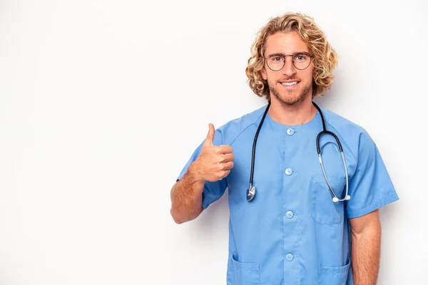 Young Nurse Caucasian Man Isolated White Background Smiling Raising Thumb — Stock Photo, Image