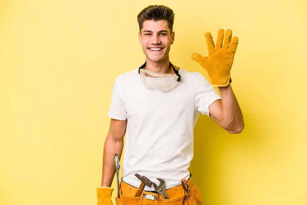 Young Electrician Caucasian Man Isolated Yellow Background Smiling Cheerful Showing — Stock Fotó