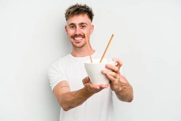 Young Caucasian Man Eating Noodles Isolated White Background — Fotografia de Stock
