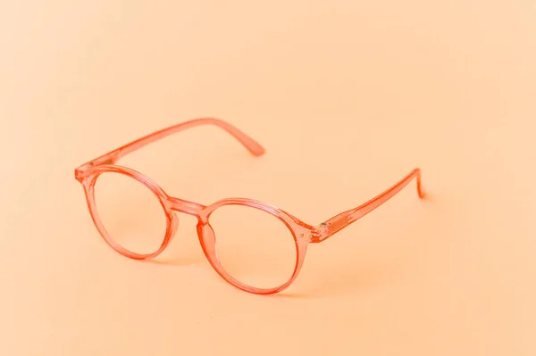 Rosa Transparenta Glasögon Isolerad Beige Bakgrund — Stockfoto