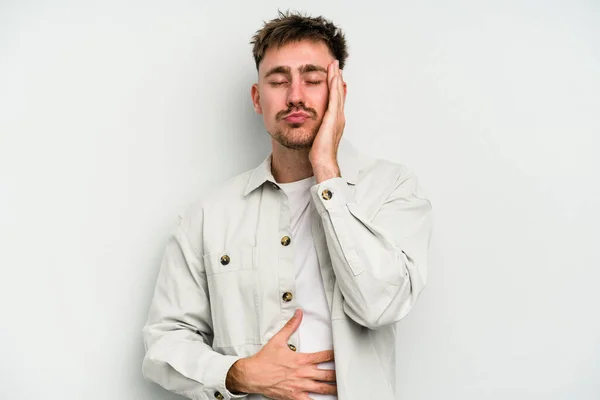 Young Caucasian Man Isolated White Background Blows Cheeks Has Tired — Stock Photo, Image