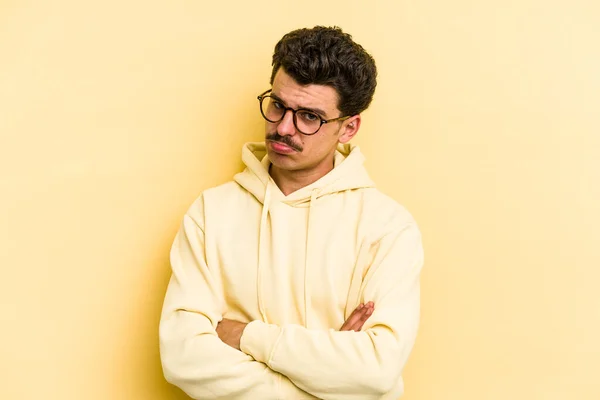 Young Caucasian Man Isolated Yellow Background Unhappy Looking Camera Sarcastic — Stock Photo, Image