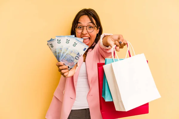 Young Hispanic Woman Holding Shopping Bag Isolated Yellow Background — Photo