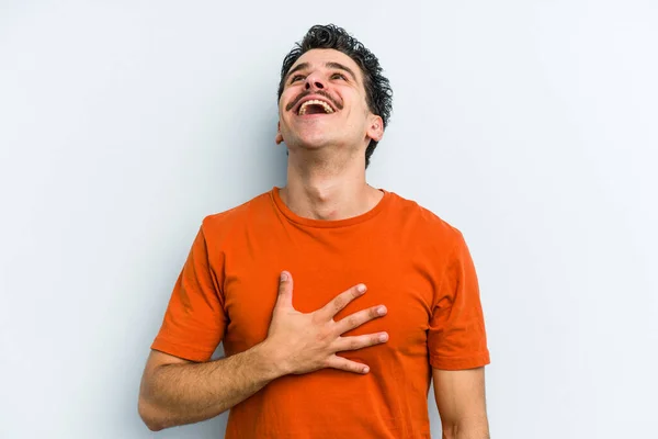 Young Caucasian Man Isolated Blue Background Laughs Out Loudly Keeping — Stock Photo, Image