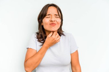 Mavi arka planda izole edilmiş genç İspanyol kadın hoşlanmadığı bir hareket gösteriyor. Anlaşmazlık konsepti.