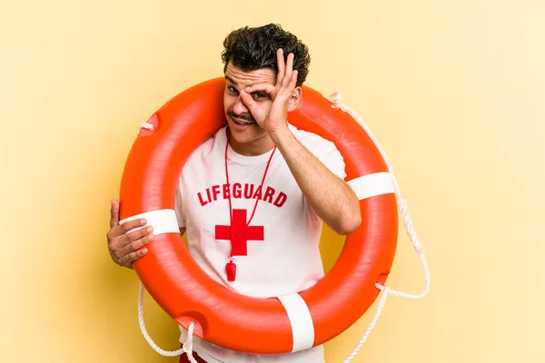 Young Caucasian Lifeguard Man Isolated Yellow Background Excited Keeping Gesture — Fotografia de Stock
