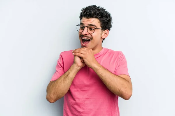 Young Caucasian Man Isolated Blue Background Keeps Hands Chin Looking — Stock Photo, Image